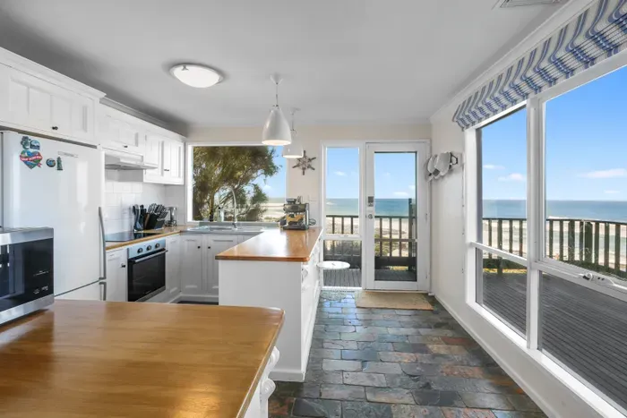 A fully equipped kitchen with sweeping Southern Ocean views