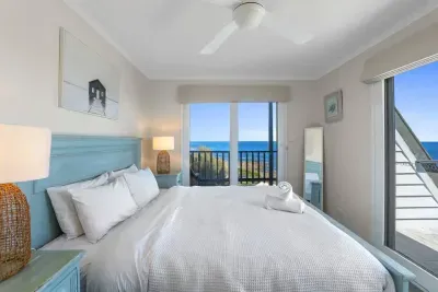Wake up to endless ocean views from the master suite with two private balconies.