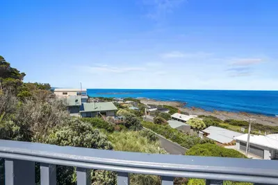 East-facing private master balcony with sweeping ocean views