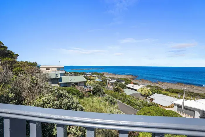 East-facing private master balcony with sweeping ocean views
