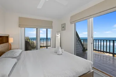 Wake up to sweeping Southern Ocean views from the king bedroom, with balcony access on both sides.