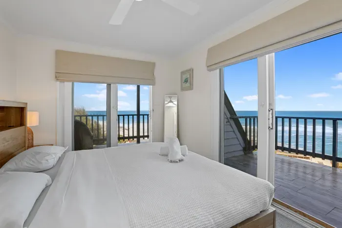 Wake up to sweeping Southern Ocean views from the king bedroom, with balcony access on both sides.