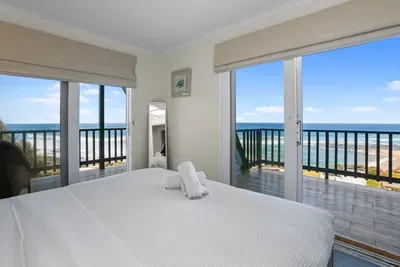 Wake up to sweeping Southern Ocean views from your king bed and two private balconies.