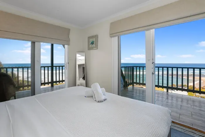 Wake up to sweeping Southern Ocean views from your king bed and two private balconies.