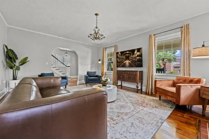 Enjoy the worth of this inviting living room as you sip your favorite bourbon after a long day of tours.