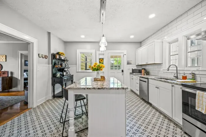 The well- stocked kitchen is equipped with everything you need to make a home cooked meal. It is a great place to gather and talk about your day while sipping on your favorite bourbon.
