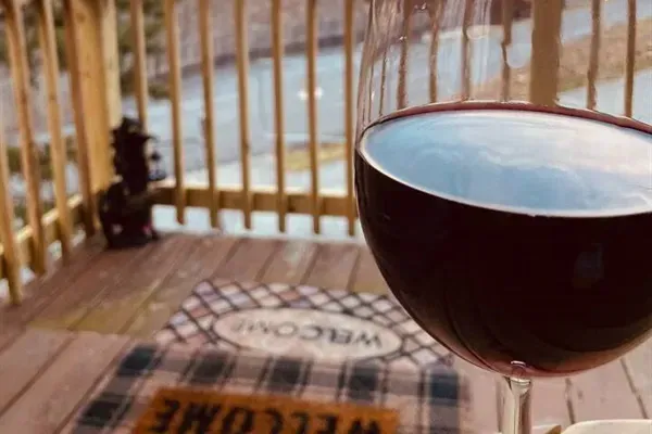 A glass of wine on the front porch