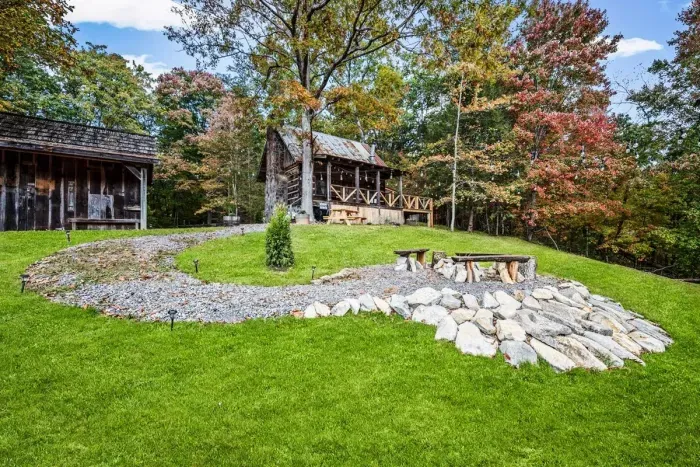 Cabin, outbuilding and firepit