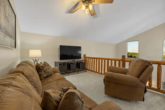 The upstairs loft is a great spot to relax with a book or to just spend some quiet time alone.