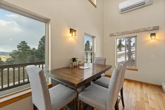 Whether dining or playing a few hands of cards, you'll find plenty of room around the table.