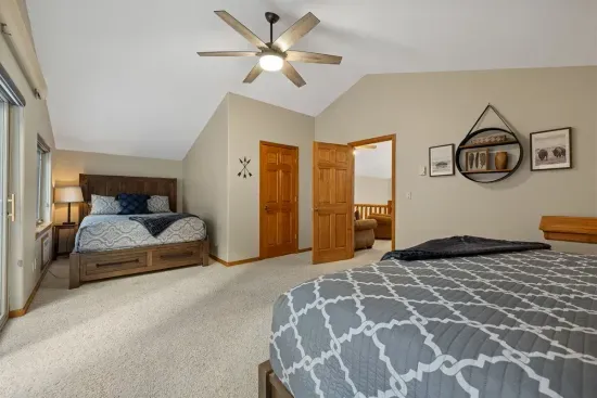 The primary bedroom is spacious and inviting.