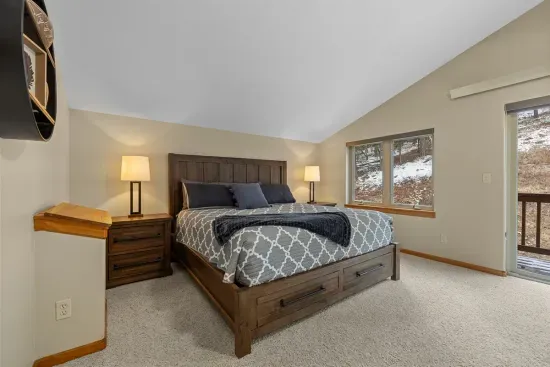 The primary bedroom features a super comfy king bed and a queen for the little ones.