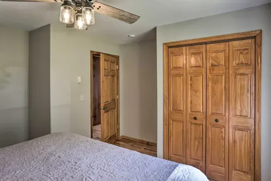 Main Floor King Bedroom #1 with a spacious closet makes you feel right at home.