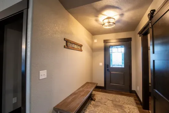 Start your adventure here—use the bench to lace up hiking boots or slip off shoes after a day on the trails.