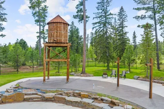 Kids will love the unique water tower-themed splash pad at Powder House Pass—a fun and refreshing way to cool off on warm Black Hills days!