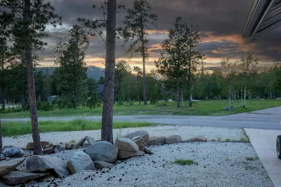 Catch stunning sunsets over Terry Peak right from the front porch—an unforgettable way to end each day in the Black Hills.