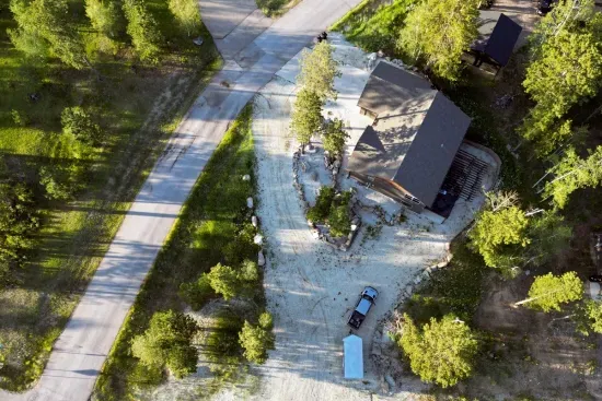 With space for 4–5 crew cab trucks pulling trailers, this pull-through driveway is the largest in Powder House Pass—perfect for groups with multiple rigs, trailers, or toys.