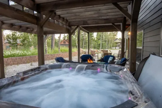 Imagine sinking into the bubbling hot tub at "On The Rocks" in South Dakota's Black Hills, letting the jets melt away your stress. 