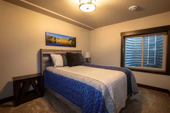 Plenty of room to spread out and make yourself at home in the lower level queen bedroom.