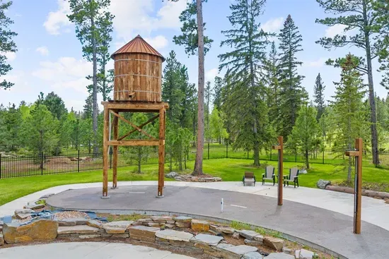 The Powder House Pass splash pad is a favorite during the summer months. Kids love cooling off here after a day exploring the Black Hills while adults relax nearby under the tall pines.

Option 2