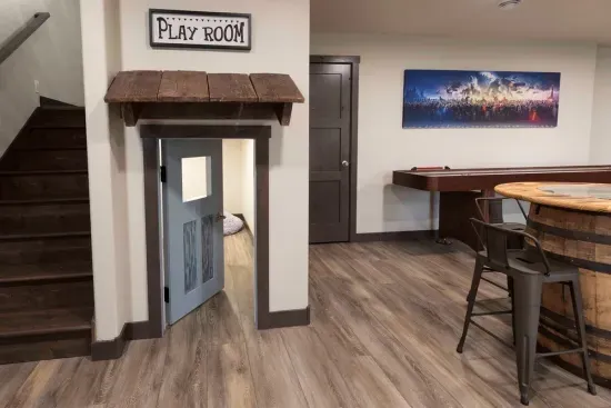 Kids love discovering this hidden playroom under the stairs. It quickly becomes their favorite hangout while the rest of the group enjoys the game room.