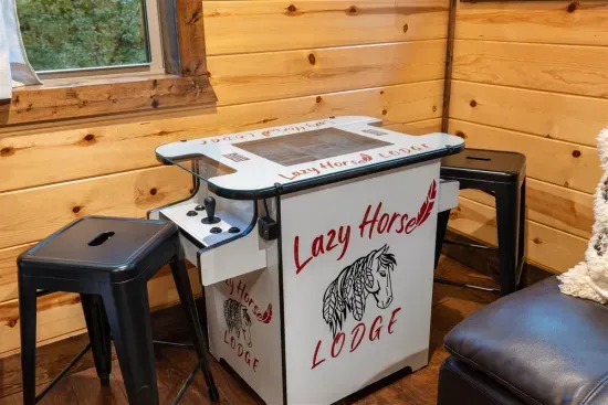 Kids and grownups will enjoy playing 100+ retro arcade games on the console in the Loft Bunkroom.