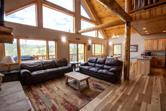 The open floor plan creates a smooth flow between the kitchen and living room, perfect for gathering and relaxation.