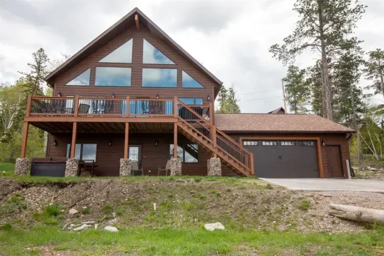 The stunning view from the house blends seamlessly with the natural beauty of the Black Hills.