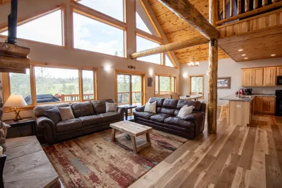 The expansive wall of windows lets the beauty of the Black Hills flow right into your space, creating a stunning view from inside.