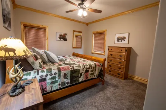 This king bed on the main floor offers the perfect retreat to rest and recharge after a day of exploring the hills.