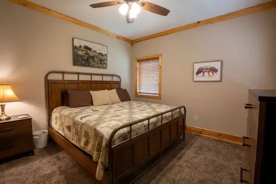 Spread out and relax in the spacious upstairs king bedroom, offering plenty of room for comfort and ease.