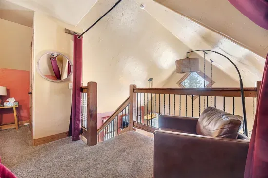 Take a break from your adventures in the reading nook in the loft.