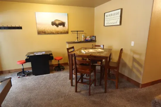 A retro arcade, board games and ring swing are just some of the great activities in the downstairs living room.