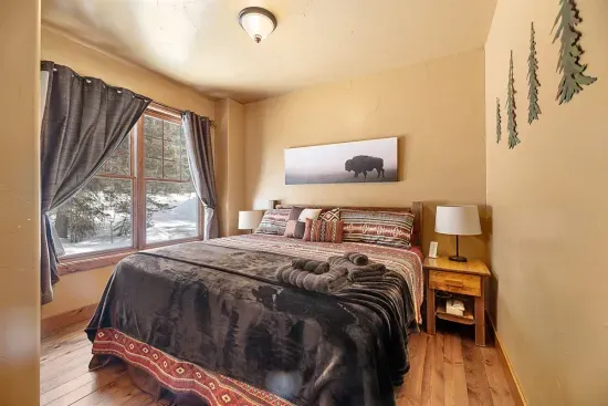 The Primary King Bedroom has an amazingly comfortable mattress and luxurious bedding.