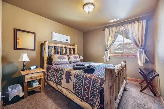Lower Level Queen Bedroom with comfortable new memory foam mattress and luxurious bedding.