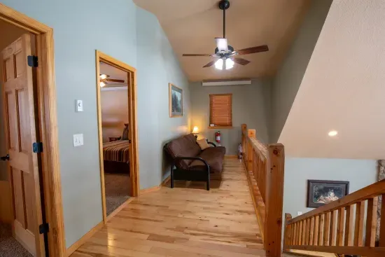 The loft offers a cozy retreat where you can escape with a good book, relax with your devices, or simply take a quiet break from the day's activities.