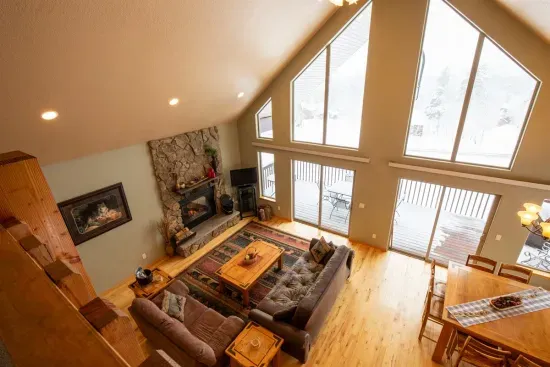 The open floor plan seamlessly connects the kitchen and living room, creating a spacious and inviting area for gatherings and relaxation.