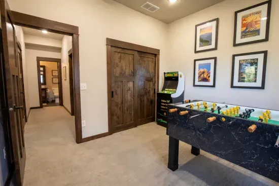 The game room is a central feature of the lower level.