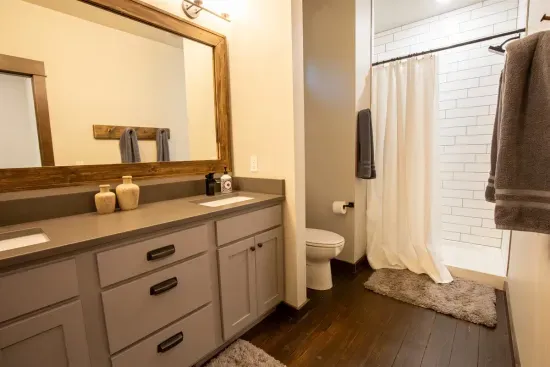 With a walk in shower and his and hers sinks, you'll be ready for adventure in no time.