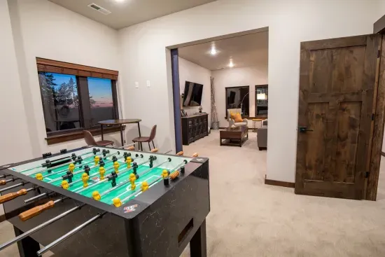 The lower level game room will set you up to challenge your friends and family to foosball.