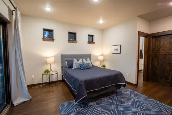 The primary ensuite bedroom is roomy and comfortable.