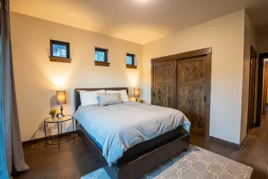 The top level ensuite bedroom is private and the views from the upper level deck are amazing.