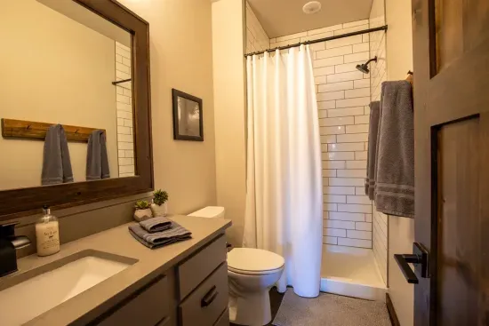 The loft bathroom is convenient and well appointed.