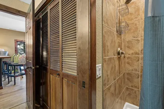 Inviting shower in the lower level living room.