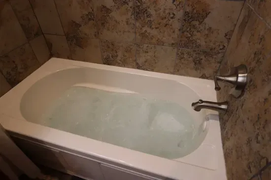 Soak away your stress in the jacuzzi tub in the King Ensuite Bathroom.