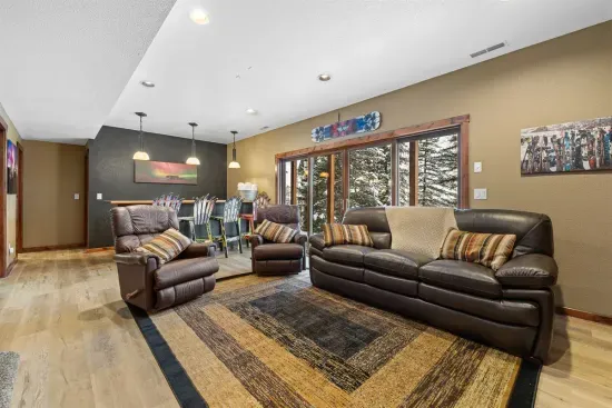 The lower level living room allows for guests to stretch out and relax.