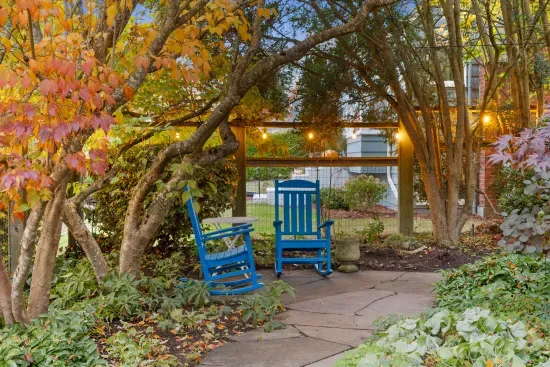 Garden seating for our guests, two rocking chairs and a side table.