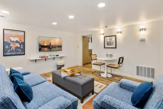 Easy to curl up on the deep vintage sofa and chair and watch the 50" smart tv.  Forget a book?  We have options!