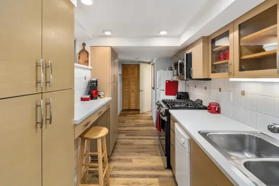 Fully stocked galley kitchen with counter seating. Enjoy your Keurig coffee maker and complimentary Keurig pods and teas.