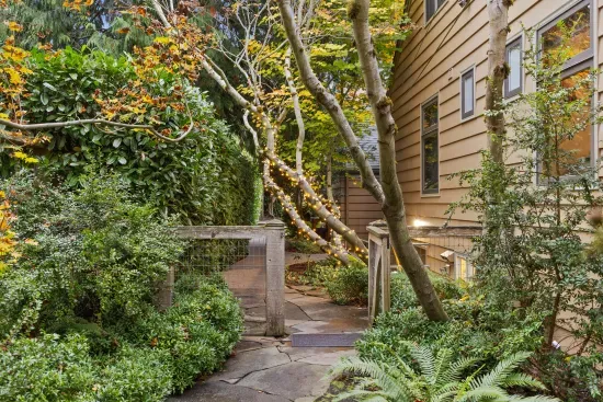 Blue stone path leads to the private apartment entry